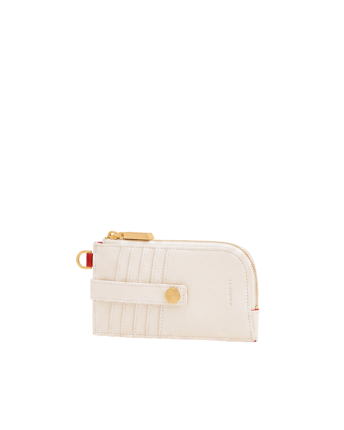 Beige wallet with gold accents on a white background