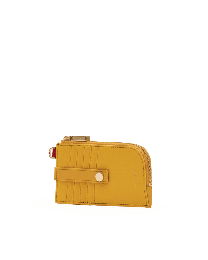A yellow leather zip-around card holder wallet with a snap-button strap closure and gold-tone hardware, shown on a plain white background.