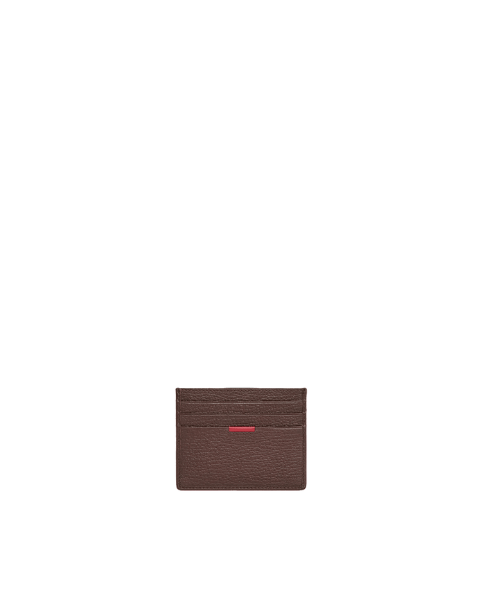 A dark brown textured leather card holder with a small red accent stripe on the front, centered against a solid white background.
