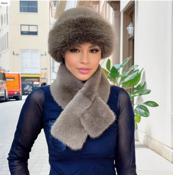 Conjunto de invierno compuesto por una cálida bufanda y un gorro de tejido de felpa grueso.-ES