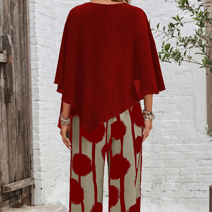 Elegante conjunto con top de manga tres cuartos y pantalón estampado-ES