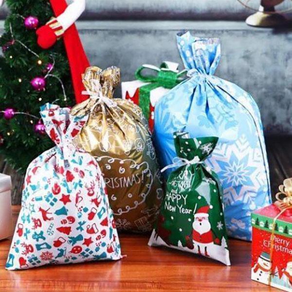 🎅🎁La mejor bolsa de regalo de Navidad con cordón del mundo-ES