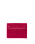 Pink leather clutch bag with gold hardware on a white background