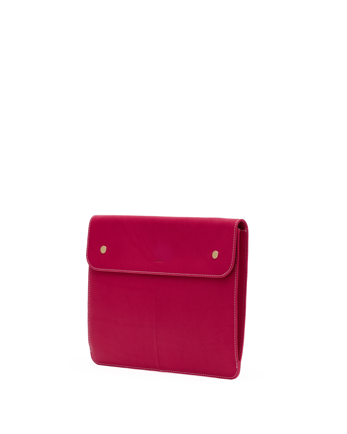 Pink pouch with gold zippers on a white background