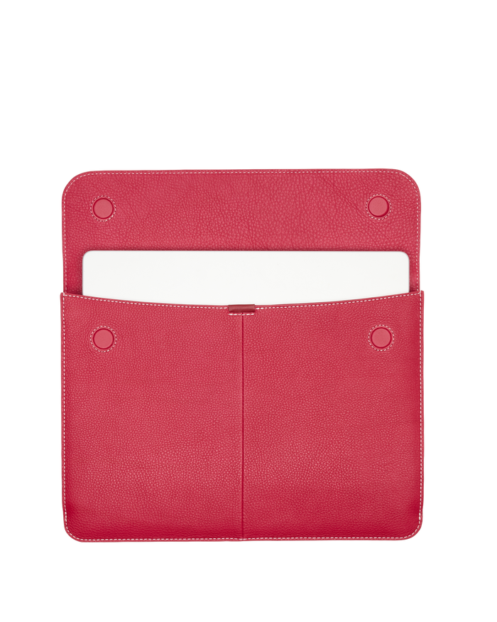 Red leather wallet with a white card holder.