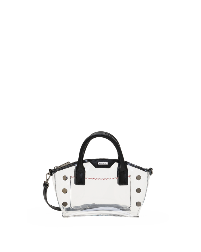 A clear transparent handbag with black leather handles and trim, silver-tone studs, and a small red stitched detail on the front.
