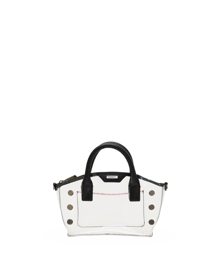 A small structured handbag with a glossy white body, black top handles, and silver-tone studs and hardware.