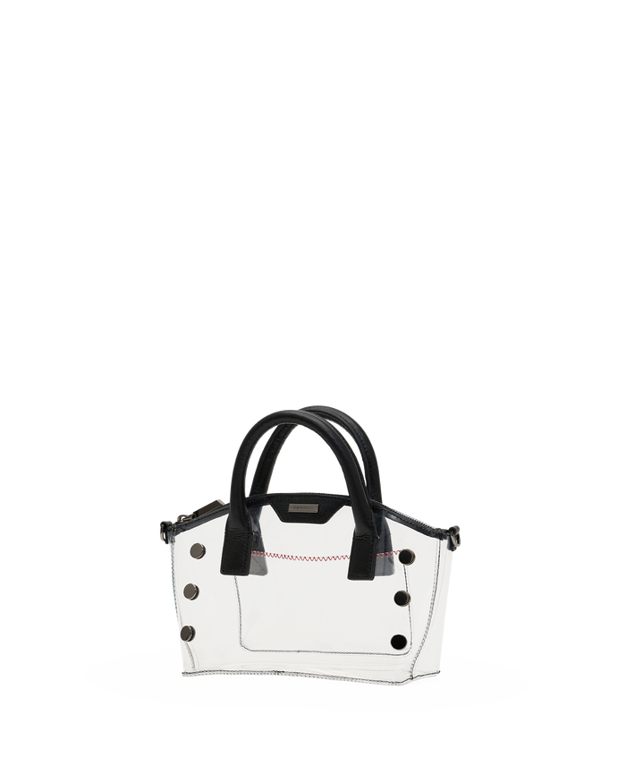 A small structured handbag with a glossy white body, black handles, and black decorative studs.