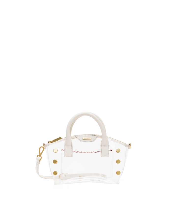 A clear acrylic handbag with white faux-leather trim, gold-tone hardware, and a white top handle.