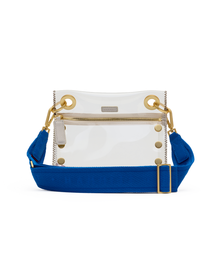 Clear handbag with blue strap and gold accents on a white background